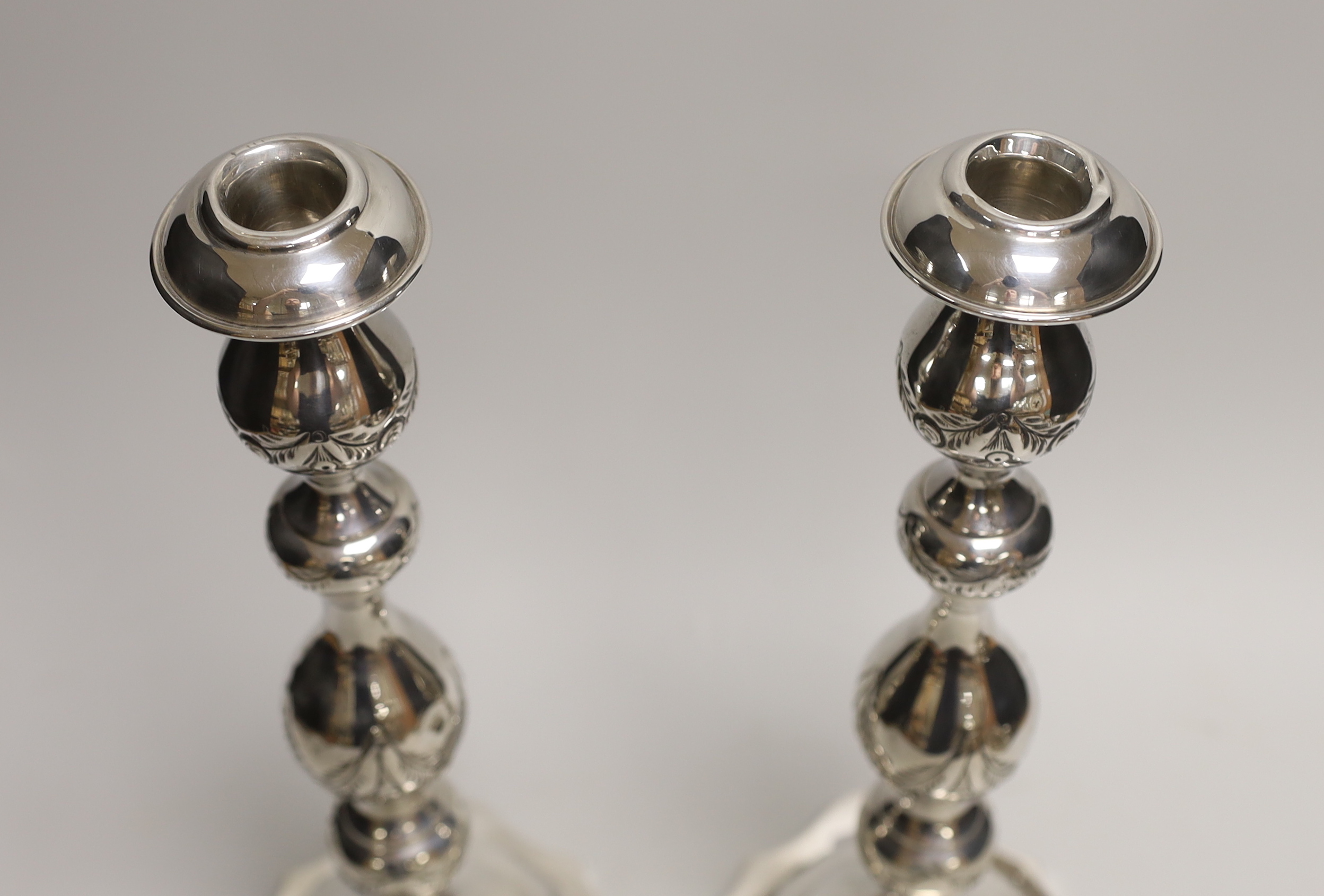 A pair of George V silver Sabbath Day candlesticks, Rosenzweig, Taitelbaum & Co, London, 1930, 34cm, 20oz.